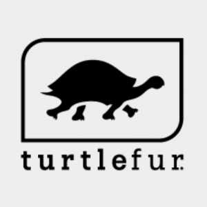 Turtle Fur logo in all black with the silhouette of a turtle as the icon