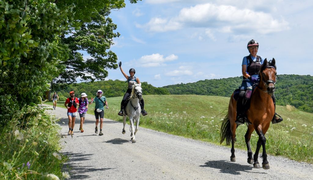 Riders and runners on course together in recent years. 